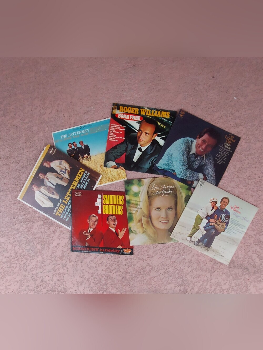 A collection of seven vintage vinyl records (LPs) from the 1960s and 1970s.